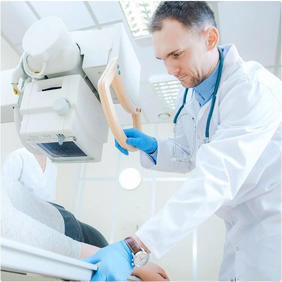 Doctor Scanning Patient with Machine